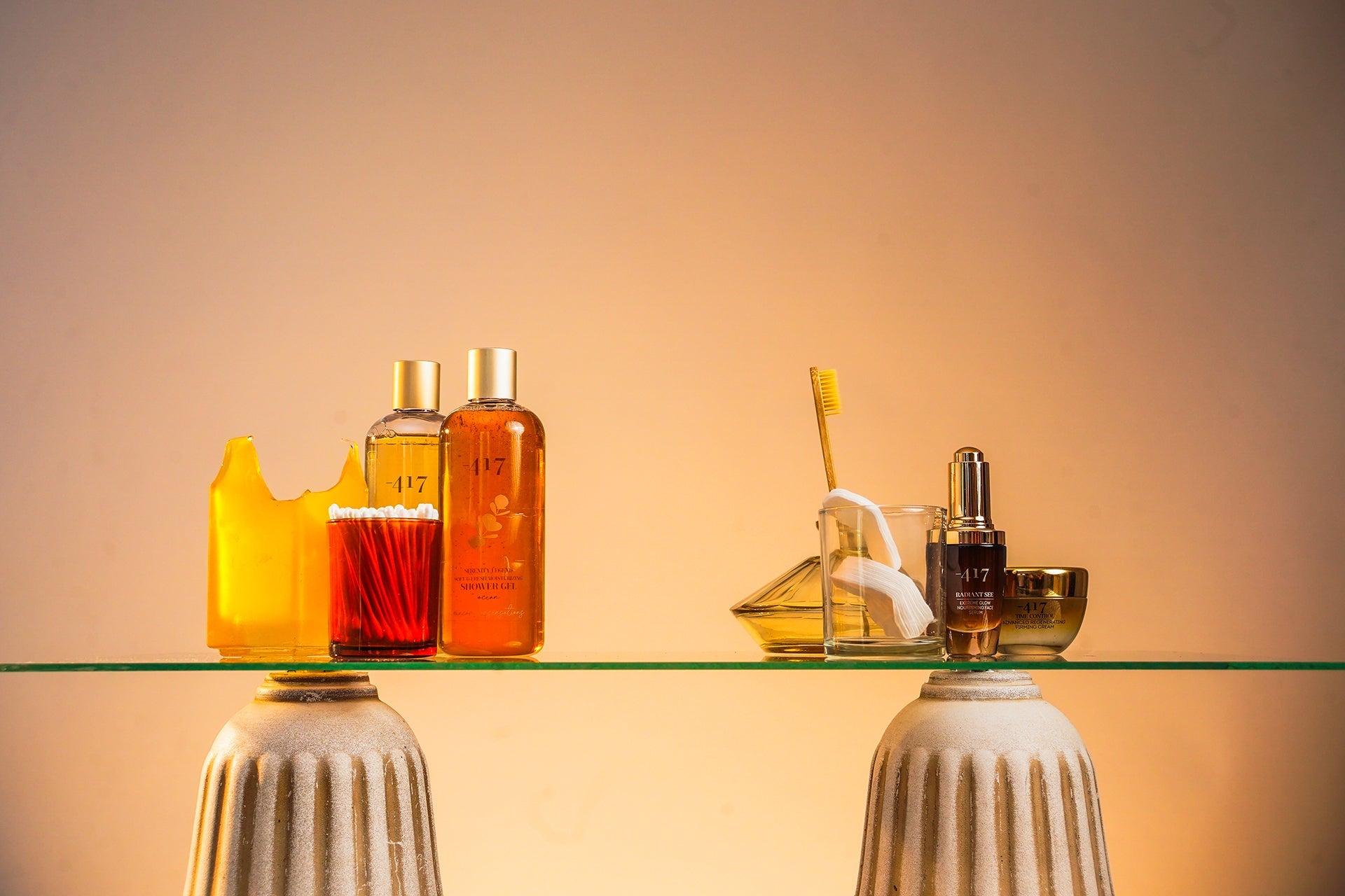 417 natural skincare products displayed on a glass table
